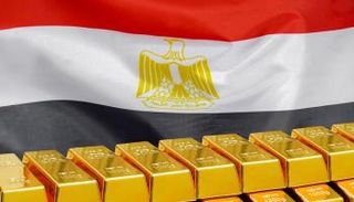 سبائك ذهبية وعلم مصر