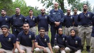 جانب من فريق الدعم الشرطي الإماراتي (وزارة الداخلية)