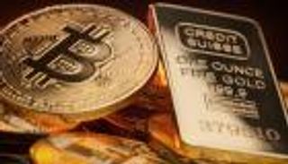 الذهب وبيتكوين.. من يربح بعد قرار الفيدرالي الأمريكي؟
