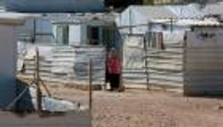  لاجئون سوريون في مخيم الزعتري بالأردن.. التردد يرجئ خيار العودة (صور)