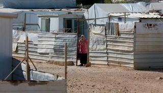 لاجئة سورية بمخيم الزعتري في الأردن