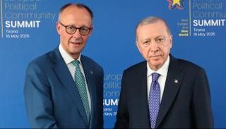 أردوغان وميرتس خلال لقاء سابق