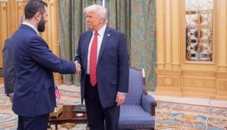 الرئيسان الأمريكي والسوري في لقاء سابق