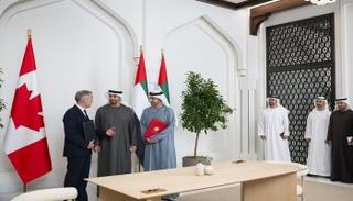 جانب من مراسم تبادل اتفاقية تشجيع الاستثمارات بين الإمارات وكندا