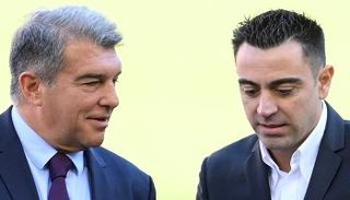 تشافي هيرنانديز وخوان لابورتا