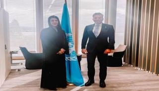  ريم الهاشمي وزيرة دولة لشؤون التعاون الدولي بالإمارات وتوم فليتشر