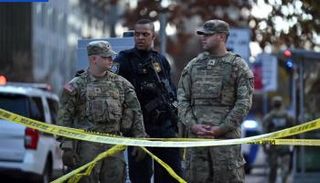 عناصر الحرس الوطني والشرطة الأمريكية في موقع الحادث