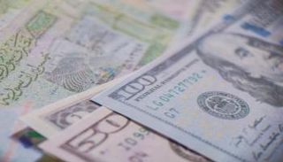 الليرة السورية مقابل الدولار الأمريكي 