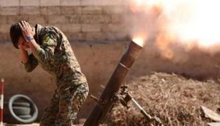 إطلاق قذيفة خلال اشتباكات في سوريا- أرشيفية