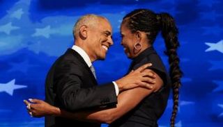 باراك أوباما وزوجته ميشيل