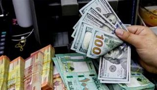 الليرة اللبنانية والدولار الأمريكي - أرشيفية