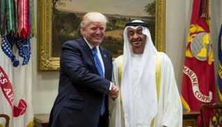 الشيخ محمد بن زايد آل نهيان والرئيس الأمريكي في لقاء سابق