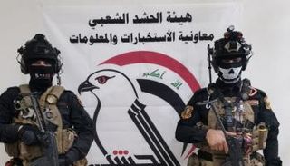 عناصر من الحشد الشعبي بالعراق