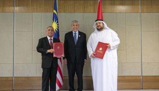 جانب من توقيع الاتفاقية