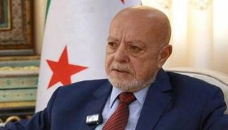 وزير الاقتصاد السوري اثناء قمة الإعلام العربي السابقة