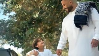 تامر حسني ونجله أدم