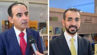 راشد محمد الكوس والدكتور علي بن تميم