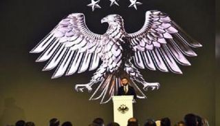 الشرع خلال إطلاق الرمز الجديد للدولة السورية