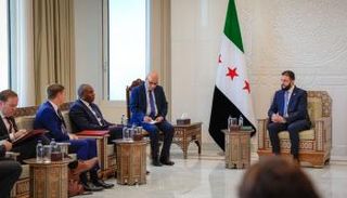 الشرع خلال لقاء وزير خارجية بريطانيا