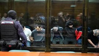 محاكمة متهمين في هجوم إرهابي في روسيا