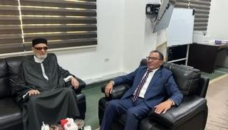 الصادق الغرياني (يسار) مع عمران القيب (يمين)