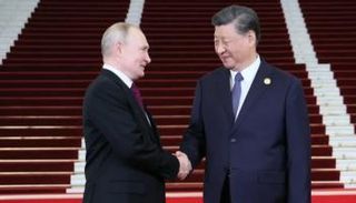 الرئيسان الصيني والروسي خلال لقاء سابق