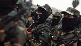 قوات حكومية سورية خلال مراسم تخرج في مدينة حلب 