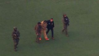 مادورو أثناء اقتياده للمحكمة