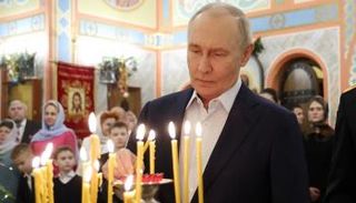 بوتين خلال قداس عيد الميلاد 