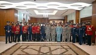  وفد الفرقة الموسيقية المركزية لسلاح الجو الأمريكي خلال زيارة لشرطة أبوظبي