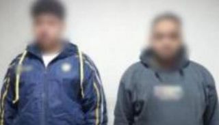 المتهمان في فيديو محل الفيوم