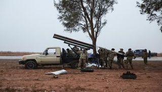 قوات حكومية سورية تستعد لإطلاق صواريخ باتجاه القوات الكردية- فرانس برس