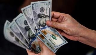 عملات ورقية فئة 100 دولار - رويترز