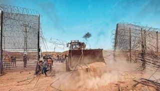مسلحو حماس يخترقون السياج الحدودي مع إسرائيل خلال هجوم أكتوبر