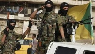 عناصر من أحد الفصائل المسلحة في العراق