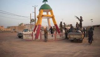 مسلحون في مدينة شمال مالي - فرانس برس