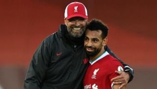 محمد صلاح ويورغن كلوب
