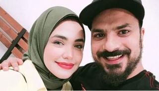 مصطفى أبو سريع وزوجته