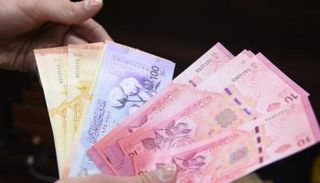 عملات ورقية من الليرة السورية