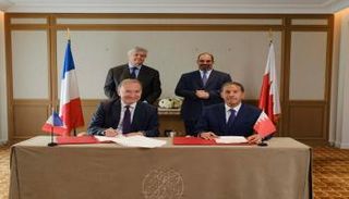 جانب من مراسم إبرام صفقة الاستحواذ