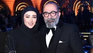 الدكتور حسام أبو العطا وزوجته الإعلامية الجزائرية آمال عراب