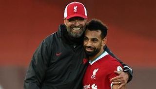 محمد صلاح ويورغن كلوب
