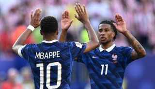 مايكل أوليس وكيليان مبابي