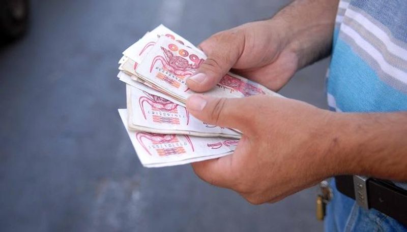 تدهور قيمة الدينار الجزائري