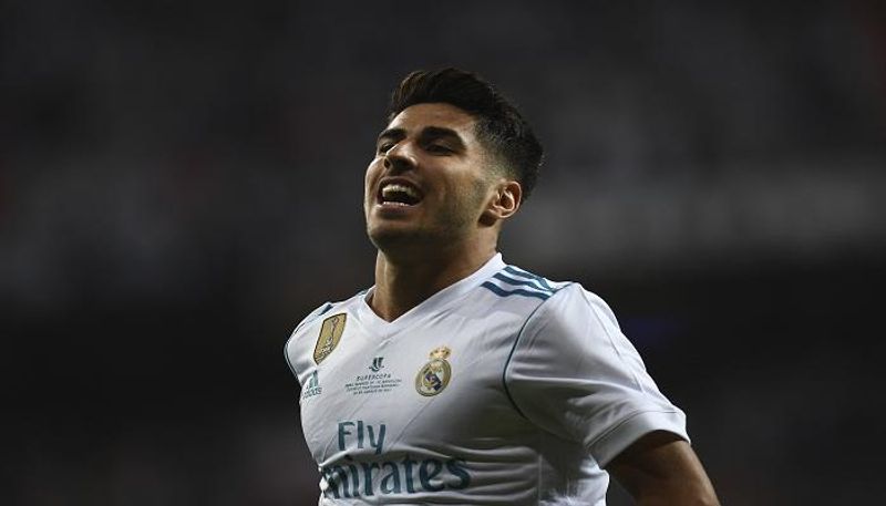 أسينسيو يحتفل بهدفه في مرمى ريال مدريد