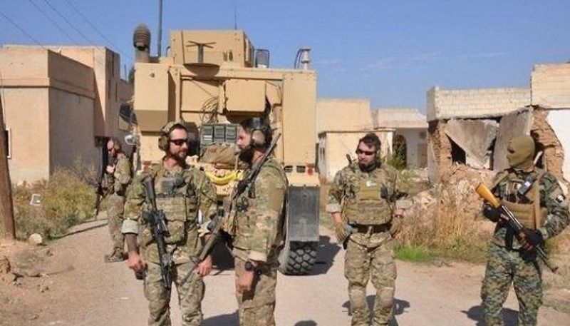 عناصر من قوات قسد والتحالف في عملية سابقة